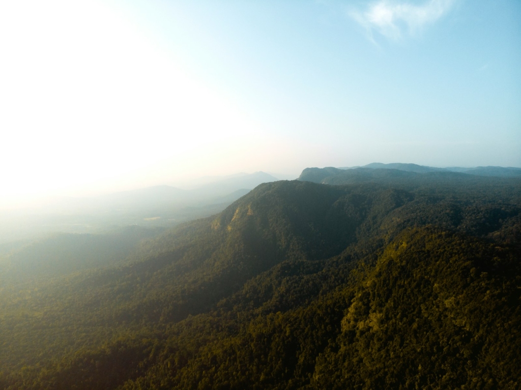 green and brown mountain under blue sky during daytime